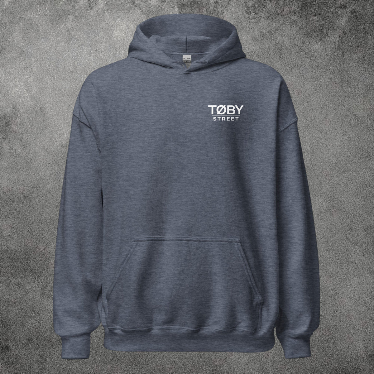 Sudadera con capucha unisex TØBY STREET en color azul marino jaspeado con bolsillo canguro y cordón de ajuste.